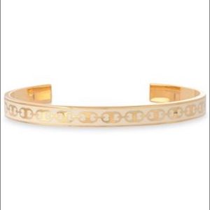 Gold tone enamel Tory Burch Bangle